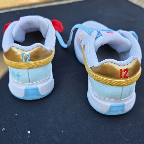 Nike Kids White Sneakers with Red and Blue Accents - Picture 4 of 14